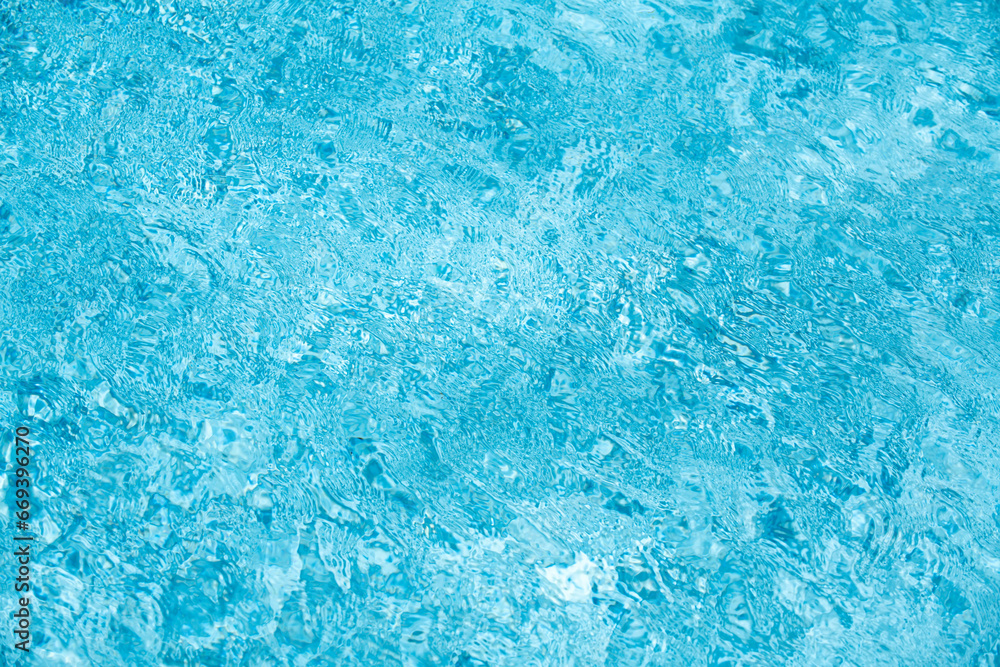 Blue ripped water in swimming pool, water pool texture and surface water backgraund.