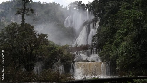 Waterfall video Thi Lo Su in Tak province waterfall largest said to be most beautiful waterfall in Thailand. Dark brown waterfall with white steam spread throughout. and 6th largest in Asia.