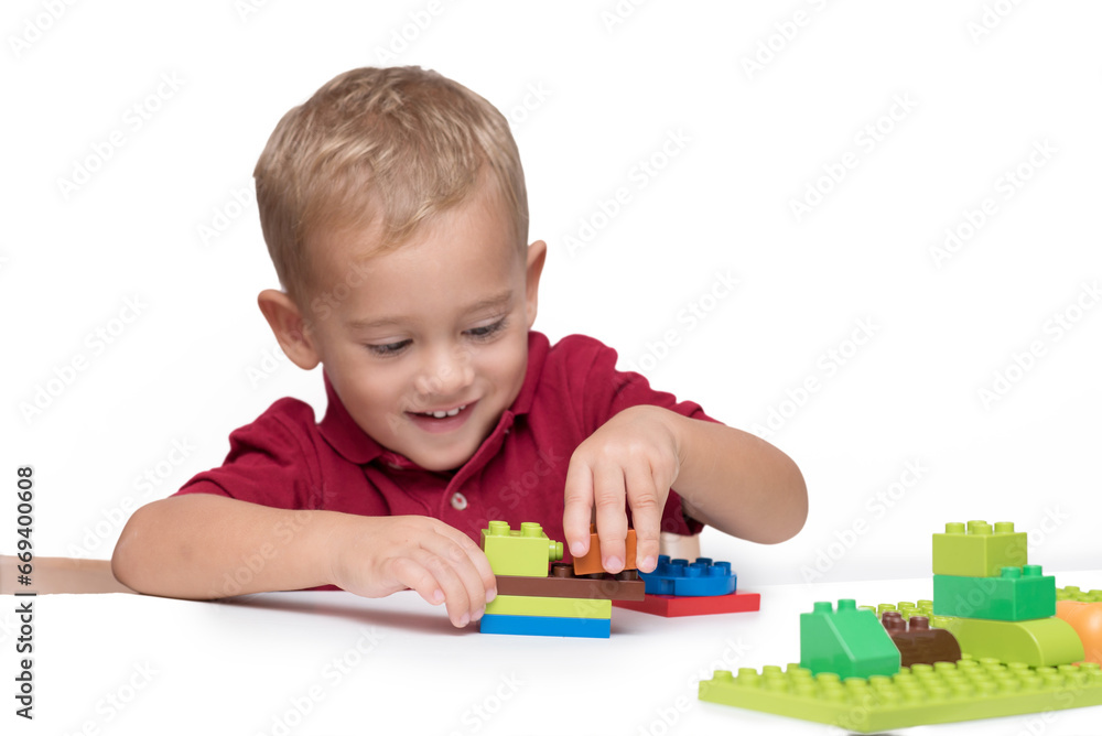 Little boy playing with building blocks Little boy playing with building blocks