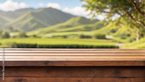 empty wooden desk with blurred background of tea gardens