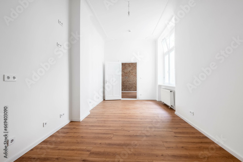 empty apartment room with wooden floor  unfurnished