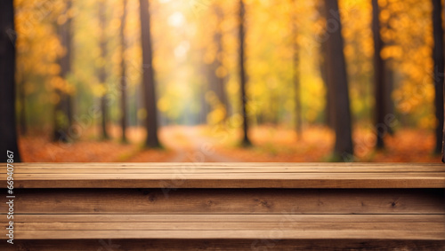 empty wood desk with blurred background of autumn forest