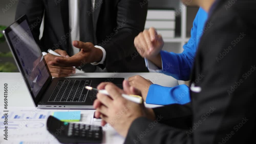 Meeting with financial advisors to analyze financial growth charts and statistics graphs to analyze strategies and plan business investments. Meeting with financial advisors to analyze financial growth charts and statistics graphs to analyze strategies and plan business investments.