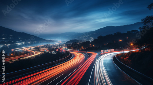 Long exposure shot of cars driving on a road by night