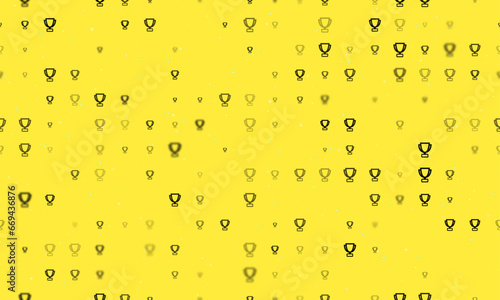 Seamless background pattern of evenly spaced black trophy symbols of different sizes and opacity. Vector illustration on yellow background with stars