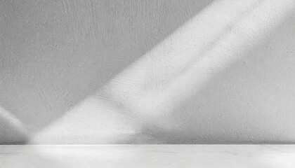 Gray background to present the product  with shadows and light from the window