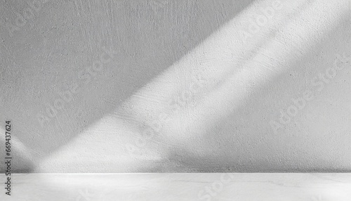 Gray background to present the product  with shadows and light from the window