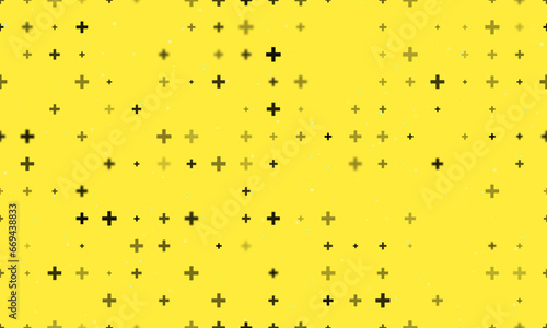 Seamless background pattern of evenly spaced black plus symbols of different sizes and opacity. Vector illustration on yellow background with stars
