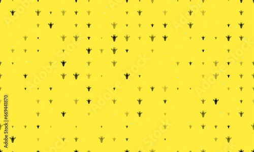 Seamless background pattern of evenly spaced black giraffe head symbols of different sizes and opacity. Vector illustration on yellow background with stars