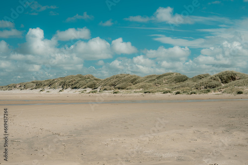 sand dunes and clouds