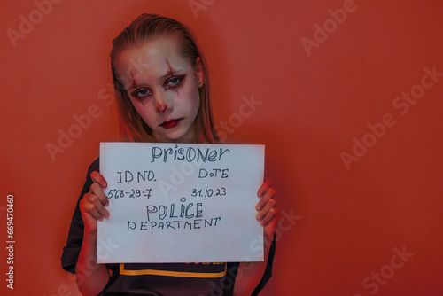 Girl with make up for Halloween on red background