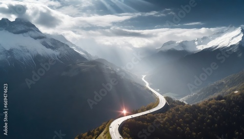  "Route montagneuse sous un ciel dramatique : lumière divine sur les Alpes
