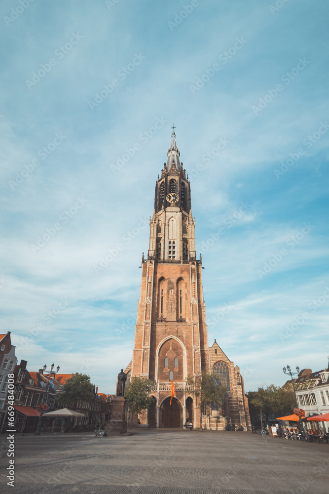 Royal Square with the largest tower in the Netherlands in the famous city of Delft. Dutch monuments