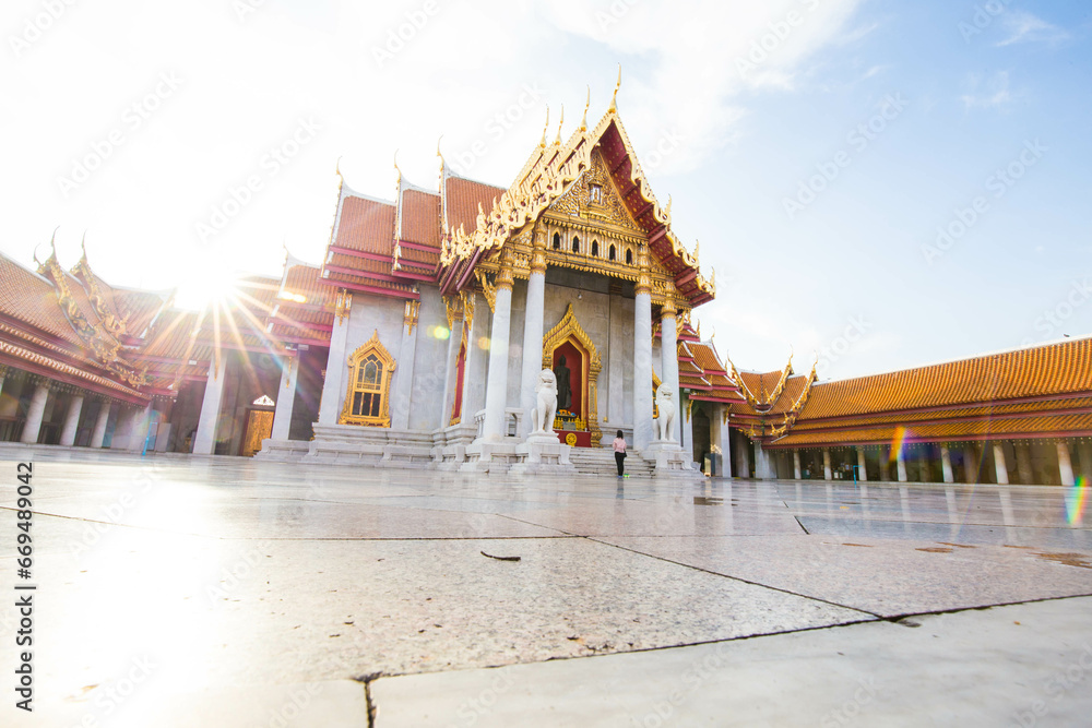Fototapeta premium Marble buddha temple with golden pagoda sightseeing travel in Bangkok city