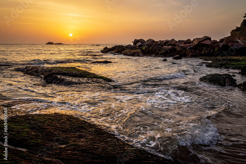 Shandong rongcheng, into a mountain sunrise at sea photo