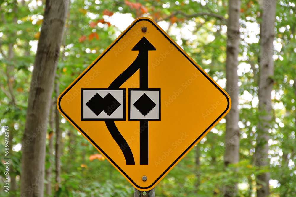 Caution yellow safety sign. Choose your way between expert and extreme. Black diamond versus double black diamond. Mountain bike trail rating sign. Concept of all roads lead to Rome. Caution yellow safety sign. Choose your way between expert and extreme. Black diamond versus double black diamond. Mountain bike trail rating sign. Concept of all roads lead to Rome.