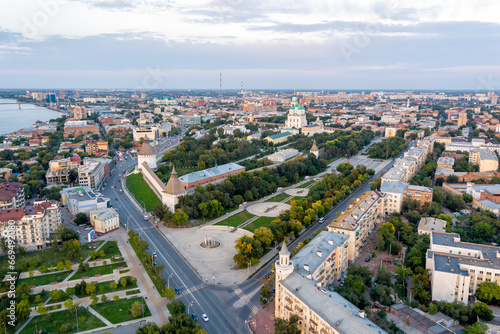 Fototapeta Naklejka Na Ścianę i Meble -  Astrakhan, Russia. Astrakhan Kremlin. Panorama of the city from the air in summer. Sunset time. Aerial view