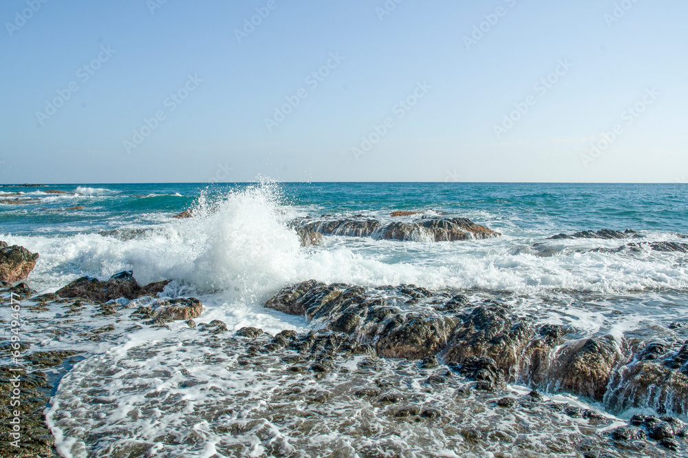 Waves breaking on the rocky shore of the Mediterranean Sea, Spain Waves breaking on the rocky shore of the Mediterranean Sea, Spain