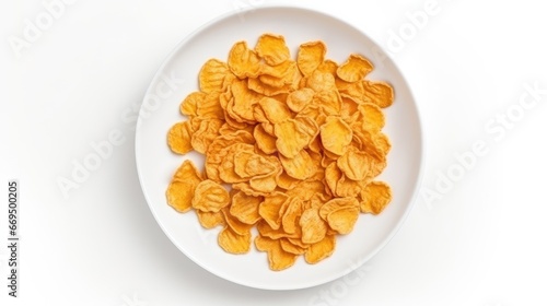 Aerial view of a Dry honey cornflakes in a ceramic plate on the dining table at home or on a white background. 