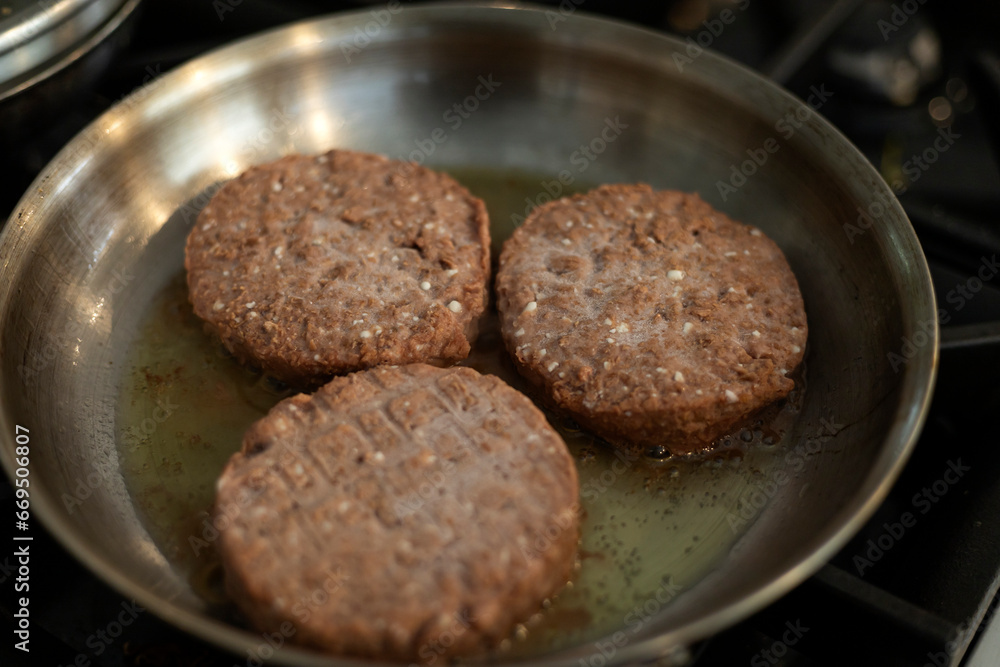 Plant base, veggie burger that looks like beef, juicy and meaty taste of a traditional hamburger Plant base, veggie burger that looks like beef, juicy and meaty taste of a traditional hamburger