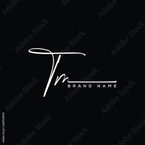 TM letter beauty handwriting vector logo. 