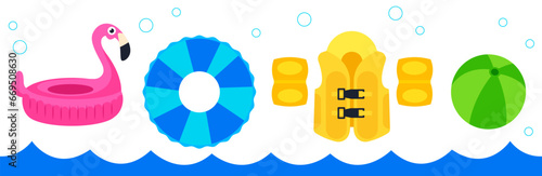 Set of inflatable accessories for swimming. Inflatable pink flamingo for swimming pool. Blue lifebuoy, yellow kids’ life jacket and green ball for games