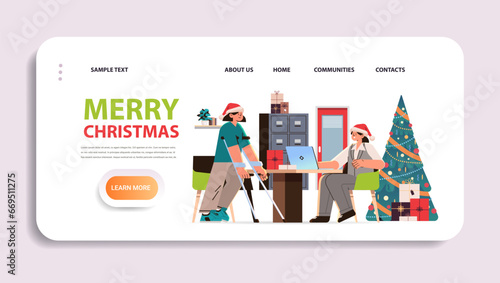 disabled woman in santa claus hat with walking stick discussing with businesswoman disability employment people with disabilities