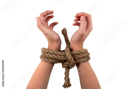 Hands tied with a strong jute rope in a knot on a white background. Hand with rope photo