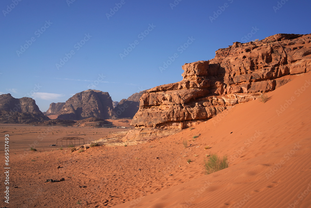 Beautiful orange sands dune of Wadi Rum desert the unique landscape Beautiful orange sands dune of Wadi Rum desert the unique landscape