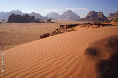 Fototapeta Naklejka Na Ścianę i Meble -  Beautiful orange sands dune of Wadi Rum desert the unique landscape