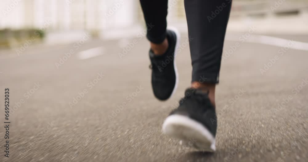 Feet, fitness and a person running on the road closeup during a marathon, race or cardio training. Exercise, shoes and a sports athlete on the street for a workout to improve health or performance Feet, fitness and a person running on the road closeup during a marathon, race or cardio training. Exercise, shoes and a sports athlete on the street for a workout to improve health or performance