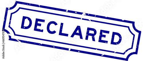 Grunge blue declared word rubber seal stamp on white background
