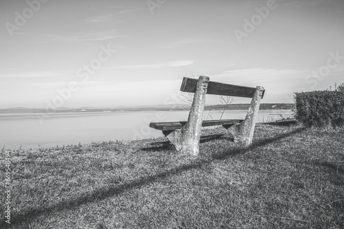 Bench on the hill,View of the Balaton lake from Balatonvilagos.Autumn season. photo