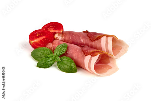 Dry cured jamon, serrano ham slices, isolated on white background.