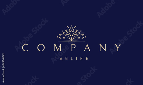 A vector golden logo with an abstract image of a branchy tree with a drop in the middle.
