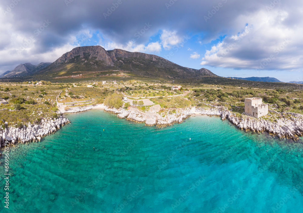 Obraz premium Aerial view beautiful water bay in the greek spectacular coast line. Turquoise blue transparent water, unique rocky cliffs, Greece summer top travel destination Mani peninsula Peloponnese
