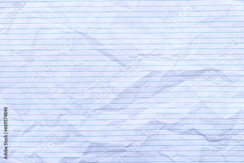 Photos Top view empty rumpled lined paper with wrinkled