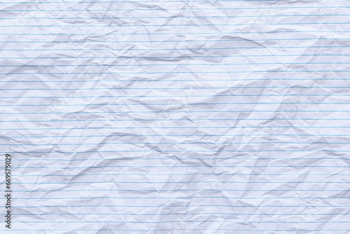Top view empty rumpled lined paper with wrinkled. Notebook lined paper background and texture. photo