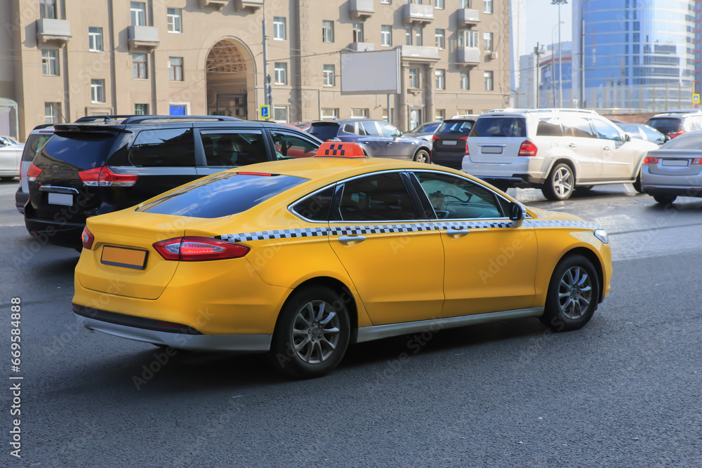 Taxi rides along the avenue in the city center