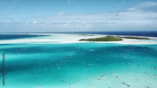 Fototapeta Naklejka Na Ścianę i Meble -  Aerial view of the stunning blue lagoon at Rangiroa Atoll; French Polynesia