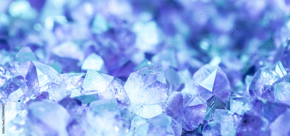 Blue Crystal Mineral Stone. Gems. Mineral crystals in the natural environment. Texture of precious and semiprecious stones. Seamless background with copy space colored shiny surface of precious stones Blue Crystal Mineral Stone. Gems. Mineral crystals in the natural environment. Texture of precious and semiprecious stones. Seamless background with copy space colored shiny surface of precious stones