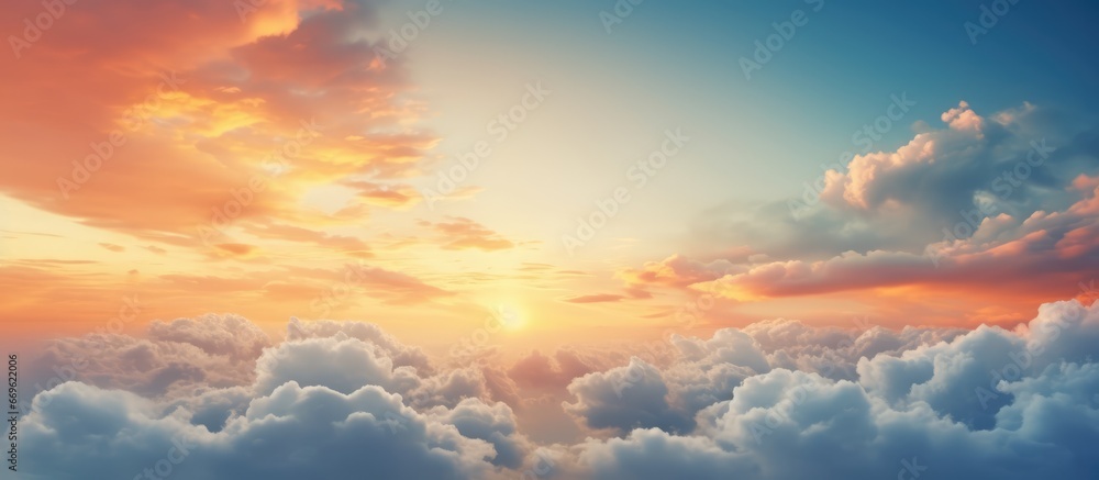 Beautiful evening scenery with golden clouds on a blue sky representing a cloudy forecast - obrazy, fototapety, plakaty 