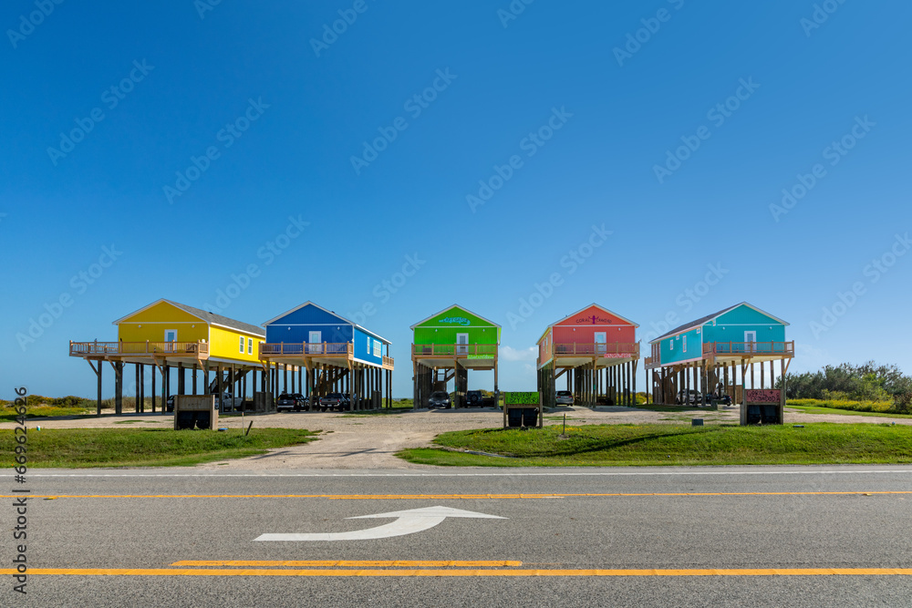 new beach houses at Port Bolivar on wooden stilts to protect against flooding, Texas new beach houses at Port Bolivar on wooden stilts to protect against flooding, Texas