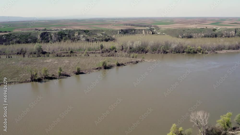 Springtime Serenity: Aerial Drone View of a River Springtime Serenity: Aerial Drone View of a River