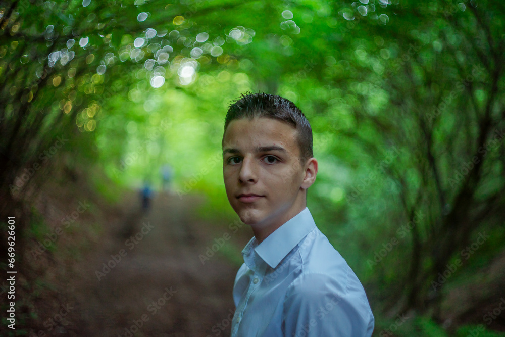 Cute little curious boy in green nature waiting for magic. Inquisitive childhood. Cute little curious boy in green nature waiting for magic. Inquisitive childhood.