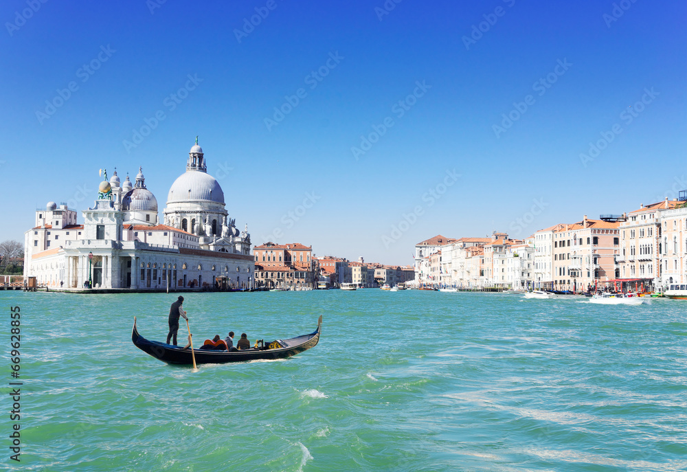 Basilica Santa Maria della Salute and Grand canal with gondola boat, Venice, Italy