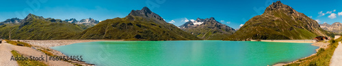 High resolution stitched alpine summer panorama with reflections in a lake at Sylvretta reservoir, Sylvretta-High-Alps-Street, Bielerhoehe, Vorarlberg, Tyrol, Austria © Martin Erdniss