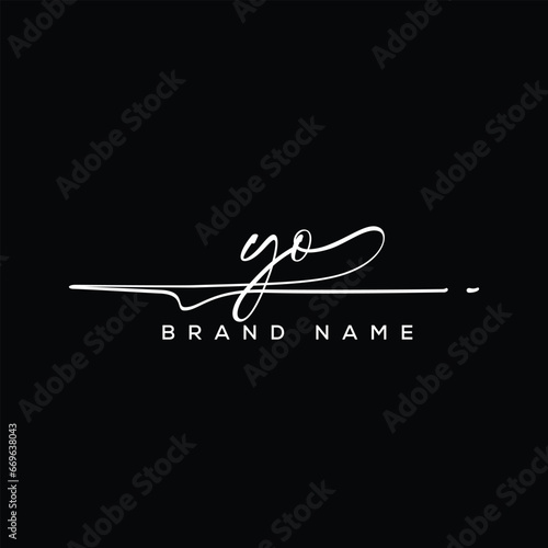 YO letter beauty handwriting vector logo. 