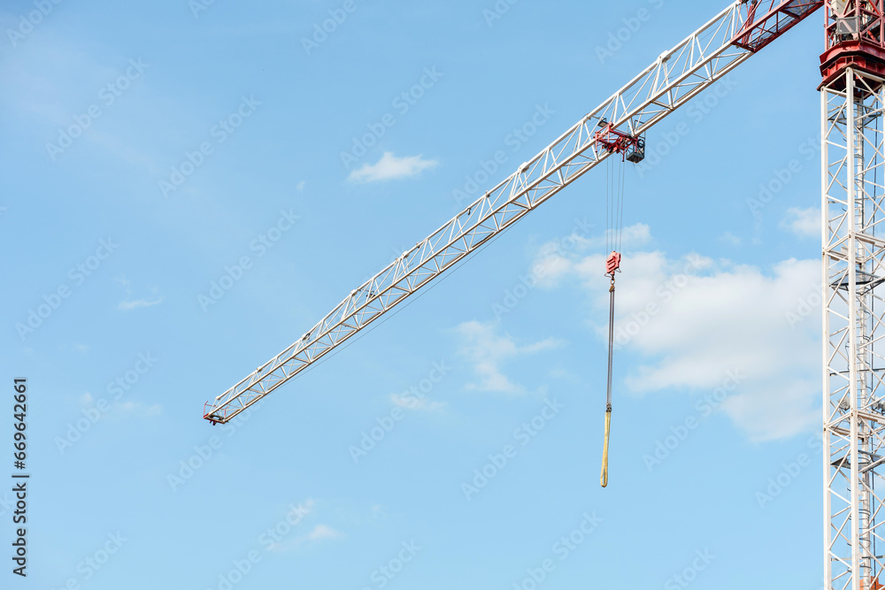 The brick building under construction is multi - storey and The brick building under construction is multi - storey and