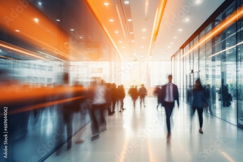 people moving fast in the hall of an office building in the city (long exposure photography)